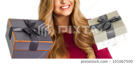 Birthday, Christmas gifts or holiday present, happy woman holding gift boxes isolated on white background, portrait 101067500