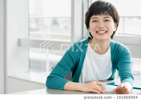 Portrait of a young woman having a conversation Portrait of a young woman having a conversation 101068984