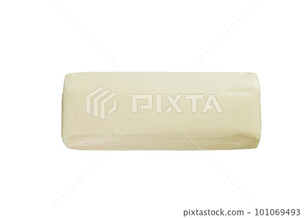 Piece of fresh butter for breakfast on kitchen table. Isolated on white background. 101069493