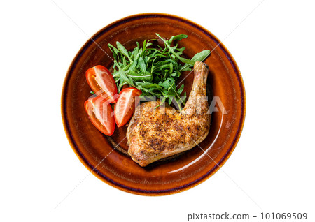 Poultry dish - roasted chicken legs with vegatables salad. Isolated on white background 101069509
