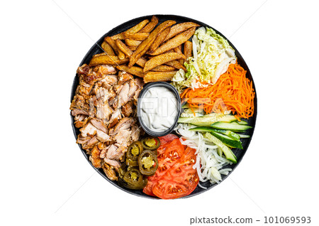 Shawarma Doner kebab on a plate with french fries and salad. Isolated on white background. 101069593