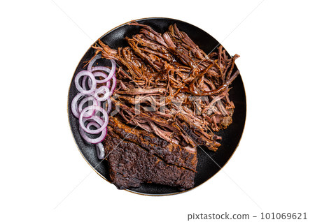BBQ pulled pork meat on plate. Isolated on white background. BBQ pulled pork meat on plate. Isolated on white background. 101069621