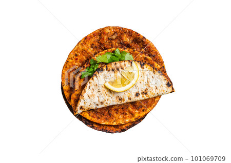 Lahmacun traditional Turkish pizza and wraps with salad on marble board with spices. Isolated on white background Lahmacun traditional Turkish pizza and wraps with salad on marble board with spices. Isolated on white background 101069709