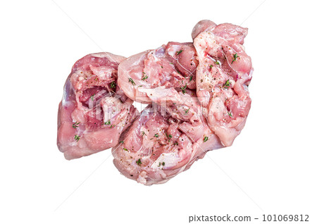 Sliced raw Chicken leg thigh fillet meat ready for cooking with spices. Isolated on white background 101069812