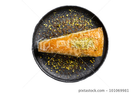 Turkish Havuc Dilim Baklava with pistachio, Carrot Slice Baklava. Isolated on white background. 101069981