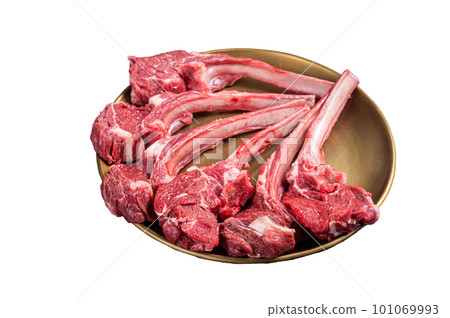 Lamb chop rib steak, raw mutton meat cutlet in golden plate. Isolated on white background Lamb chop rib steak, raw mutton meat cutlet in golden plate. Isolated on white background 101069993