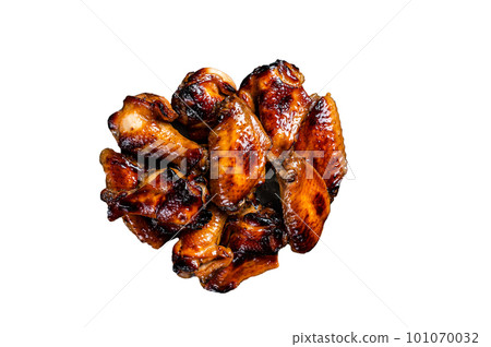 BBQ chicken wings in dip Barbecue sauce. Isolated on white background. BBQ chicken wings in dip Barbecue sauce. Isolated on white background. 101070032