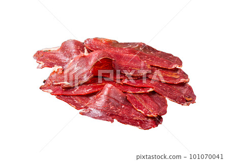 Dried sliced basturma, cured beef meat ready for eat. Isolated on white background. Dried sliced basturma, cured beef meat ready for eat. Isolated on white background. 101070041