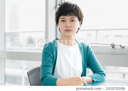Portrait of female college student studying Portrait of female college student studying 101070399