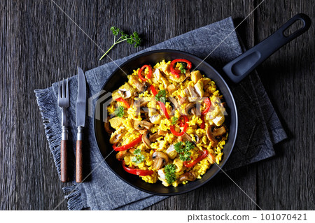 Chicken Paella with mushrooms, red pepper, spices 101070421