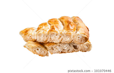 Traditional feta cheese phyllo pastry pie in rustic skillet. Isolated on white background 101070446