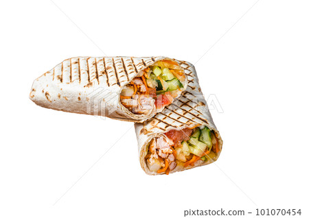 Shawarma durum doner kebab with meat and vegetable salad. Isolated on white background. Shawarma durum doner kebab with meat and vegetable salad. Isolated on white background. 101070454