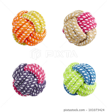 Set of four balls for pets made of cotton cord of different colors, isolated on a white background. Set of four balls for pets made of cotton cord of different colors, isolated on a white background. 101073424