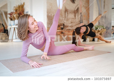 workshop of air yoga and stretching in yoga studio 101073897