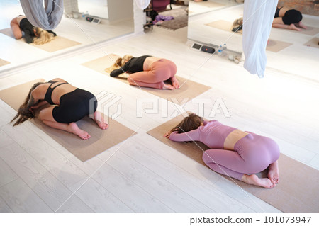 workshop of air yoga and stretching in yoga studio 101073947