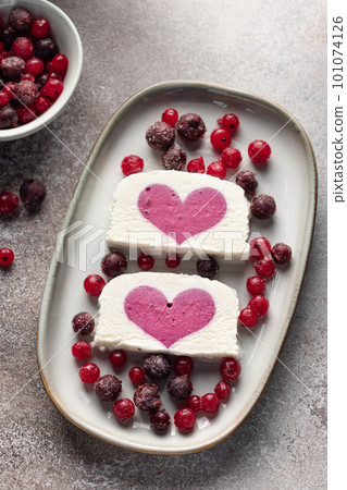 delicious ice cream with berry filling in ceramic plate delicious ice cream with berry filling in ceramic plate 101074126