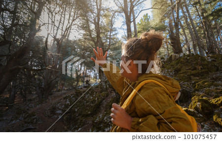 caucasian woman enjoys being in nature, 101075457