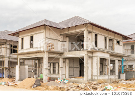 construction residential new house in progress at building site housing estate development 101075598