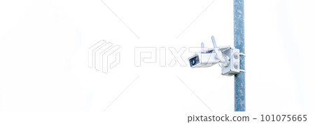 outdoor security camera on a pole. banner with copy space outdoor security camera on a pole. banner with copy space 101075665