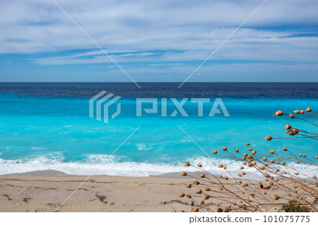 Seaside beach with azure water, island in Greece 101075775