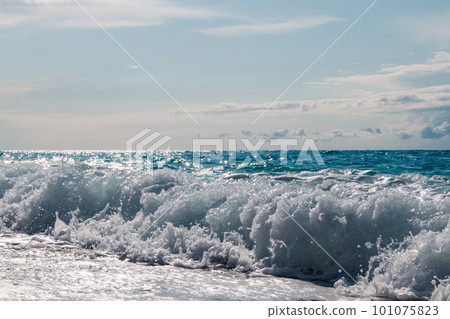 Sunny blue sea waves splash, Lefkada island Greece Sunny blue sea waves splash, Lefkada island Greece 101075823
