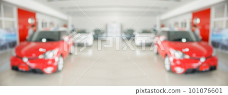 new cars in showroom interior blurred abstract background new cars in showroom interior blurred abstract background 101076601