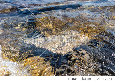 Aegean sea rocks close-up in clear sparkling water Aegean sea rocks close-up in clear sparkling water 101077274