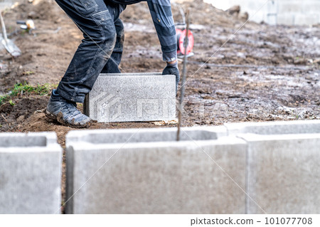 building the foundation of a house from a lost formwork building the foundation of a house from a lost formwork 101077708