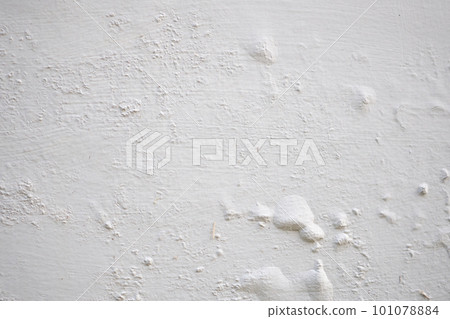 White wall damp damaged with peeling paint 101078884