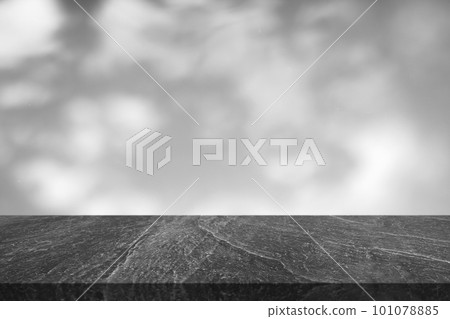 Marble table with tree shadow drop on white wall background for mockup product display 101078885