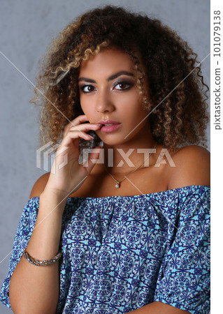 Beauty portrait of African American girl with evening makeup Beauty portrait of African American girl with evening makeup 101079138