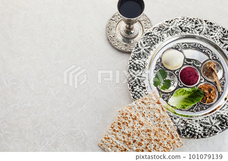 Composition with symbolic Passover, Pesach, items and meal on vintage background, 101079139