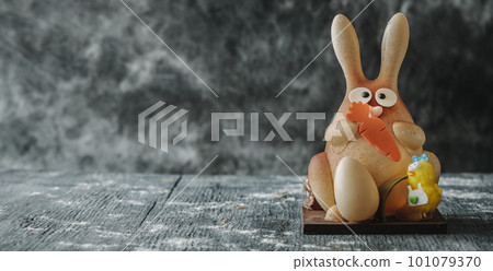 chocolate bunny as spanish mona de pascua, banner 101079370