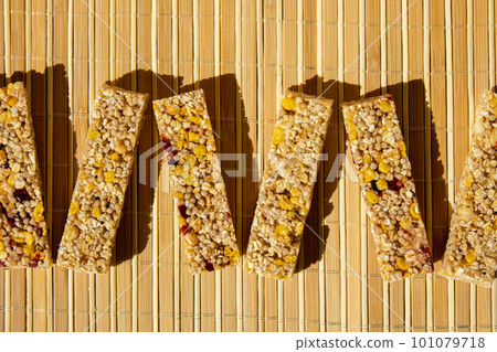 Homemade Granola energy bar. Variety of homemade protein granola breakfast bars, with nuts, raisins dried cherries and chocolate. Healthy nutrition eating Gluten free cereal dieting snack super food 101079718