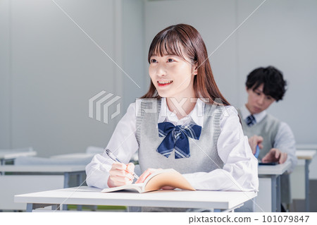 Teenagers in uniforms taking preparatory school classes Teenagers in uniforms taking preparatory school classes 101079847