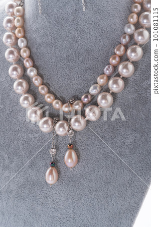 author beautiful   jewelry with pearls  demonstrated around white backround. fashion and jewelry concept 101081115