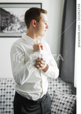Beautiful man, groom posing and preparing for wedding 101081438