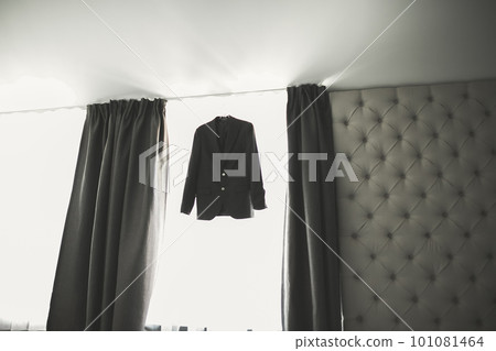 Stylish groom suit in dressing room indoors Stylish groom suit in dressing room indoors 101081464