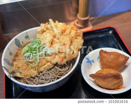 Warm soba and inari sushi 101081616