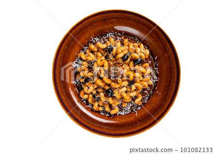 Italian Pasta Cellentani Puttanesca seafood pasta on a plate. Isolated on white background. 101082133