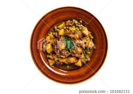 Beef veal oxtails stew with vegetables in a rustic plate. Isolated on white background. Beef veal oxtails stew with vegetables in a rustic plate. Isolated on white background. 101082151