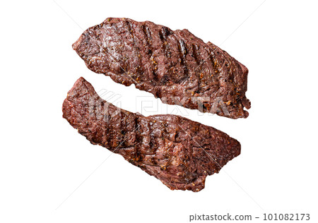 Grilled Machete skirt steak on grill. Isolated on white background. Grilled Machete skirt steak on grill. Isolated on white background. 101082173