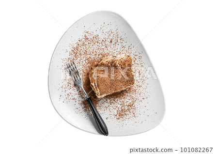 Tiramisu Italian cake with cocoa in a plate. Isolated on white background. 101082267