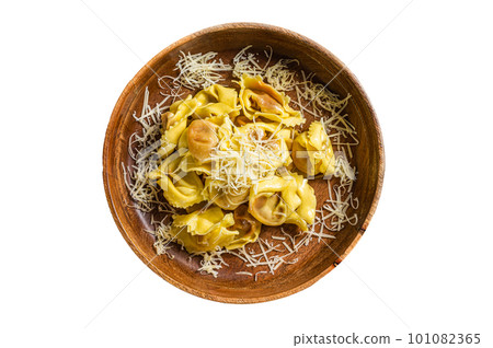 Italian ravioli Pasta with Mozzarella cheese and Tomato in wooden plate. Isolated on white background. 101082365