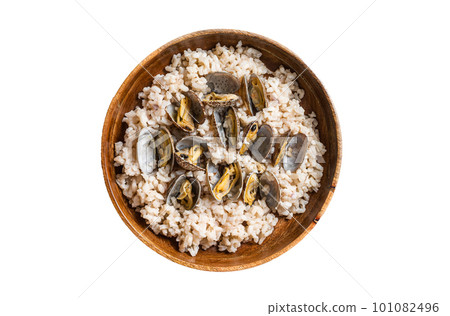 Risotto with clams and seafood in a wooden plate. Isolated on white background. Risotto with clams and seafood in a wooden plate. Isolated on white background. 101082496
