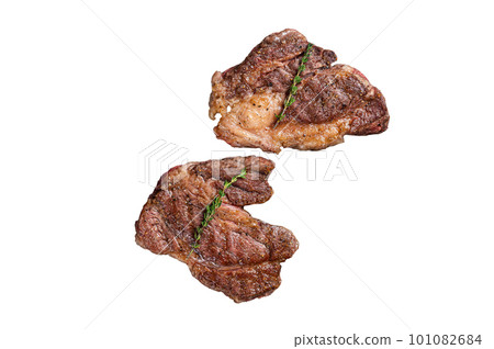 BBQ Grilled Chuck eye Roll beef steaks on grill. Isolated on white background. BBQ Grilled Chuck eye Roll beef steaks on grill. Isolated on white background. 101082684
