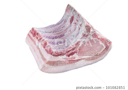 Raw whole rack of pork loin with ribs on kitchen table. Isolated on white background. Raw whole rack of pork loin with ribs on kitchen table. Isolated on white background. 101082851