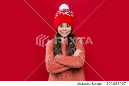 teen kid wear sweater and hat in studio. winter fashion for teen kid. hat knitwear. teen kid model teen kid wear sweater and hat in studio. winter fashion for teen kid. hat knitwear. teen kid model 101083067
