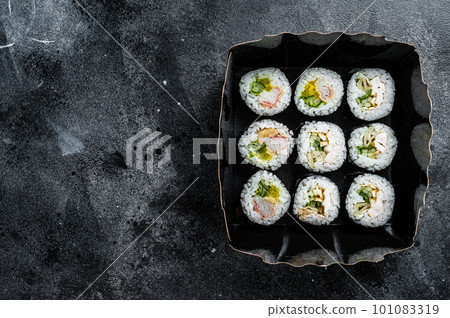 Kimbap or gimbap korean rice roll, Korean sushi. Black background. Top view. Copy space Kimbap or gimbap korean rice roll, Korean sushi. Black background. Top view. Copy space 101083319