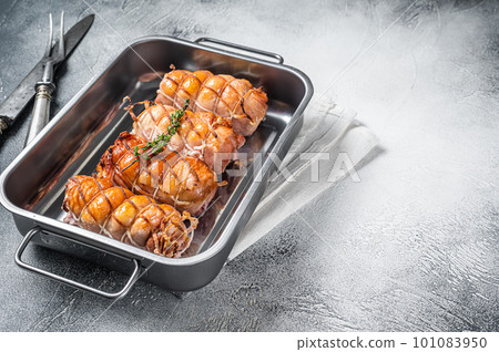 Baked Chicken breasts stuffed with cheese and bacon. White background. Top view. Copy space 101083950